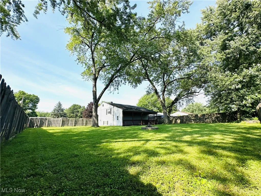 View of fenced backyard