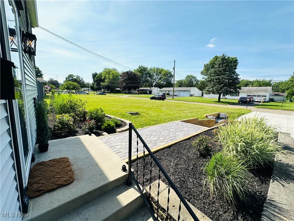 View of green lawn & fresh mulch w/new landscaping!