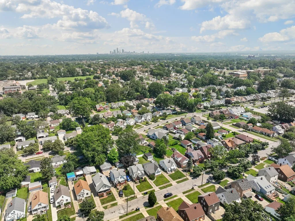 View of property location with nearby suburban area