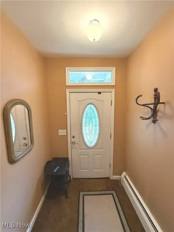 Entryway from North Hambden Street with baseboard heating