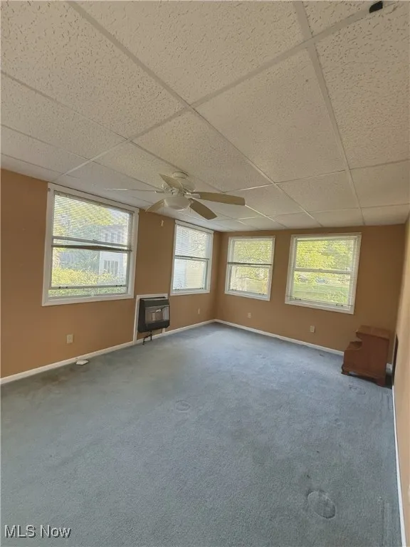 Enclosed Porch used as Bedroom with wall mounted Heating Unit, beautiful natural night, carpet floors