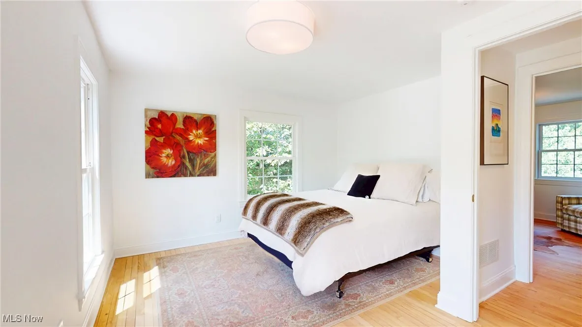 Guest Bedroom with all new wood finished floors
