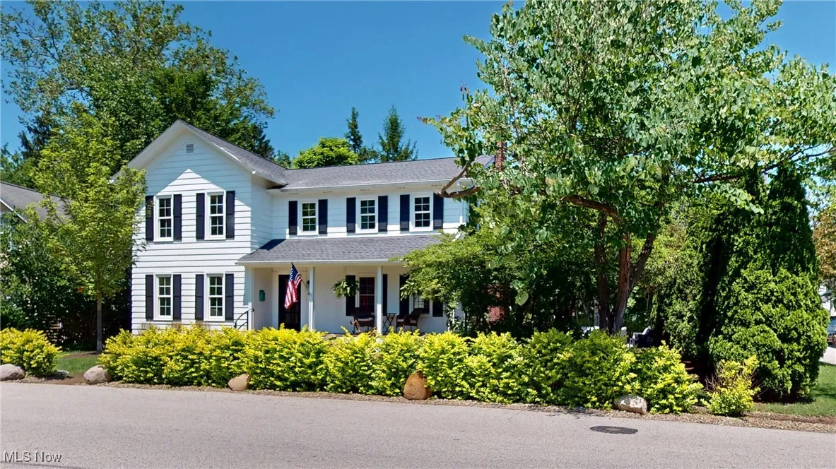 View of front facade featuring a porch and new entry walkway