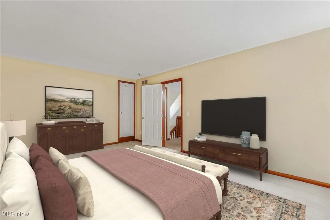 Virtually stage Bedroom with baseboards and carpet