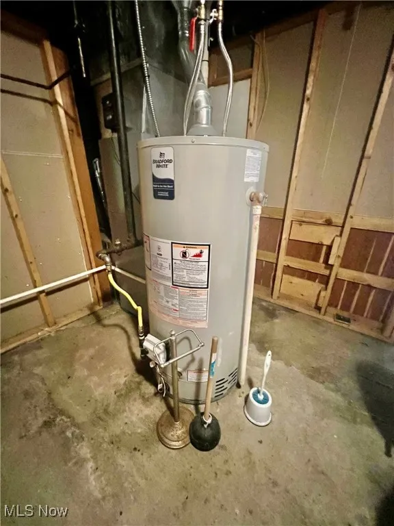 Utility room with gas water heater