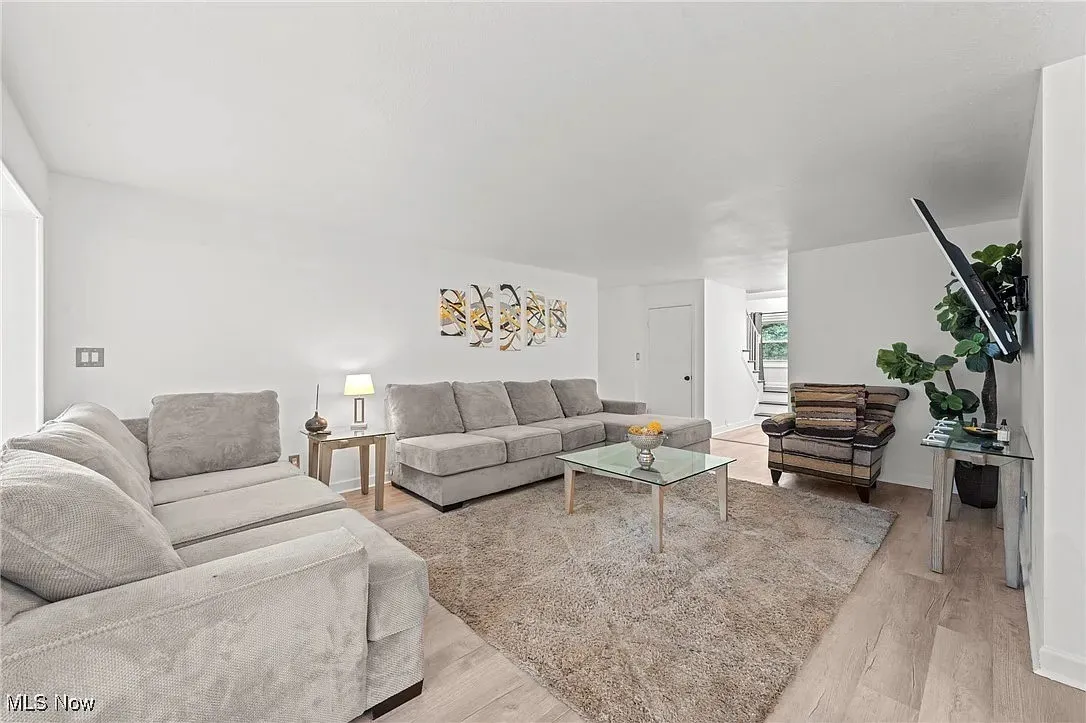 Living area featuring light wood-type flooring