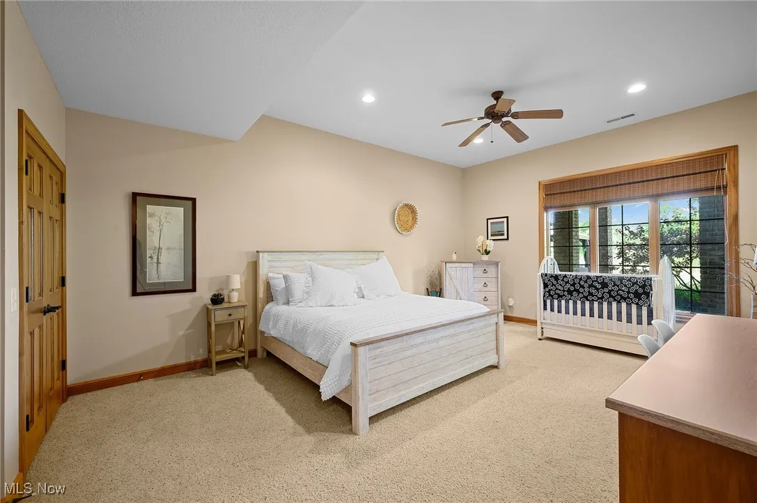 Bedroom 4 in the lower level. Both bedrooms feature built in desks.