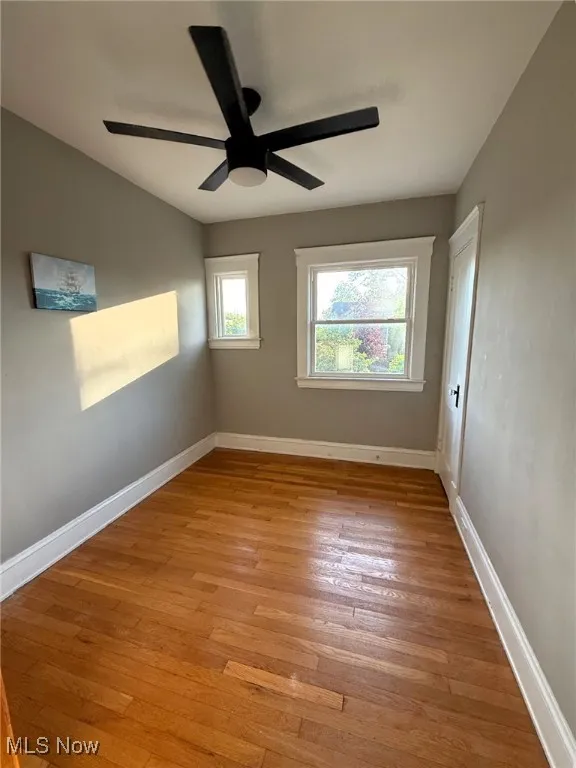 Bedroom featuring light wood flooring and a ceiling fan