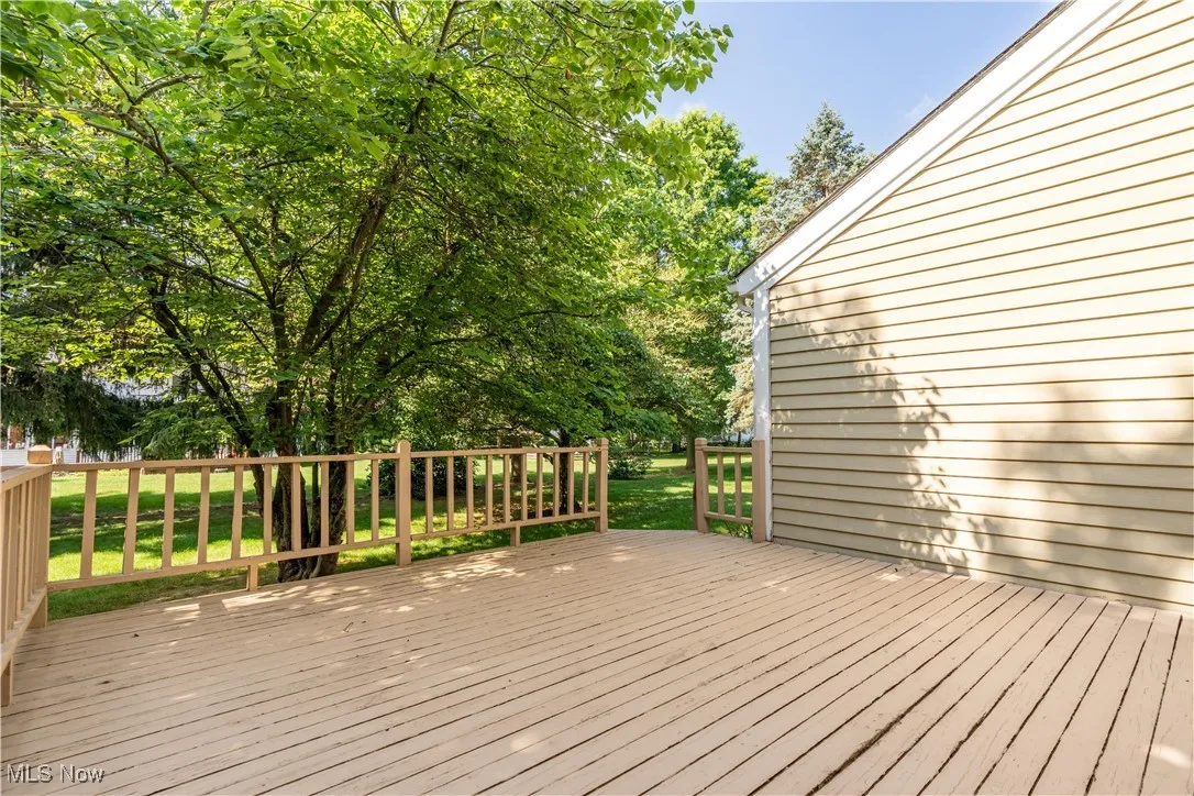 Another view of the deck and showing you the size and the mature yard.