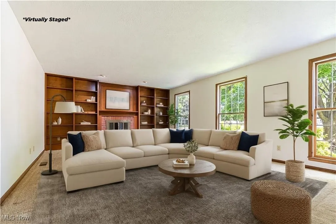 Virtually Staged - Here is another version of the family room virtually staged.  This is a large sectional.  (Though we would of turned it toward the fireplace, but gives you a concept of how large this room is)