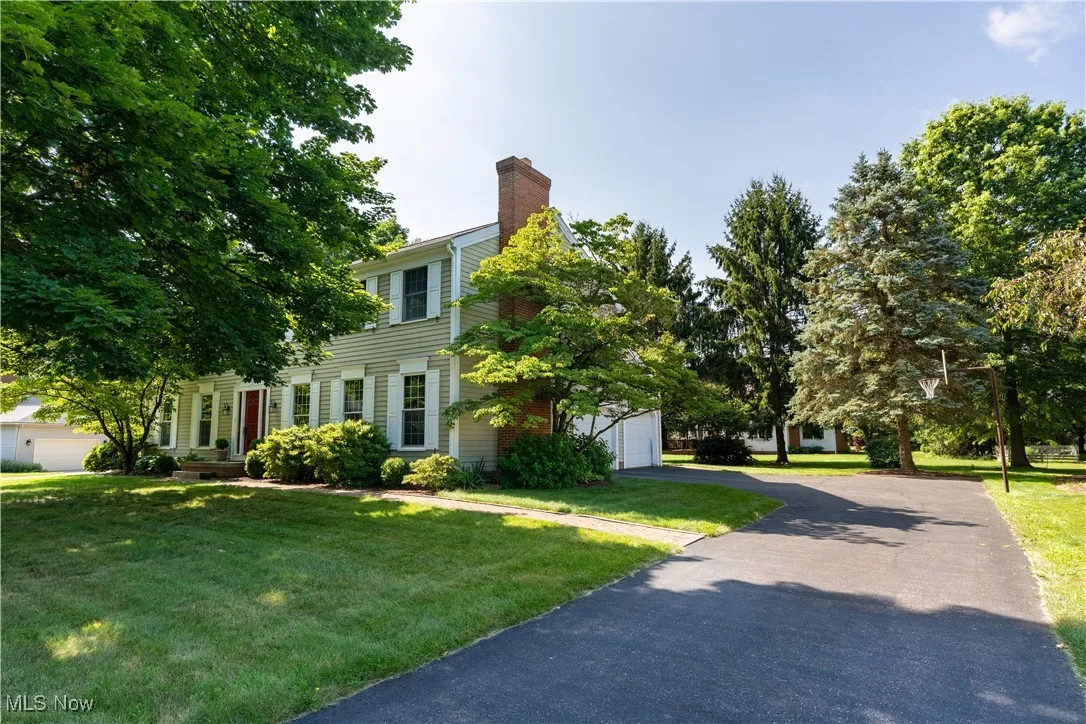 This is another view of the front of the home.   This view we want you to see the side load garage as well as the extra parking space available.