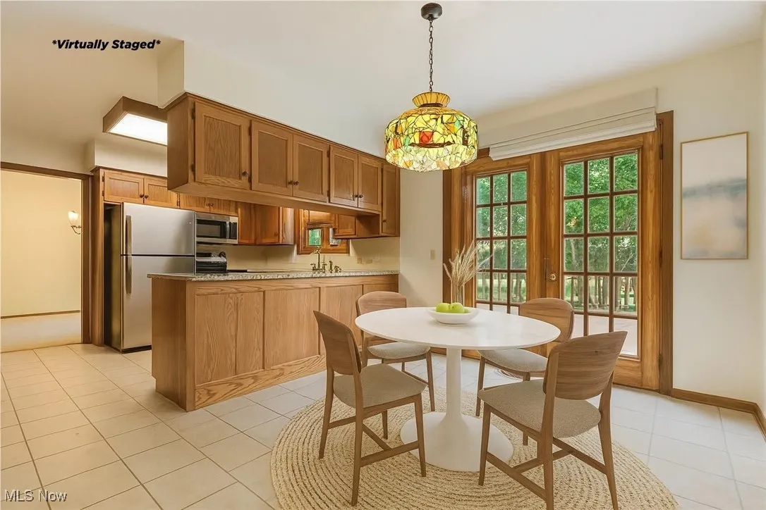 Virtually Staged  - This is virtually staged photo to show you the nice dinette and how it flows to the backyard. 

