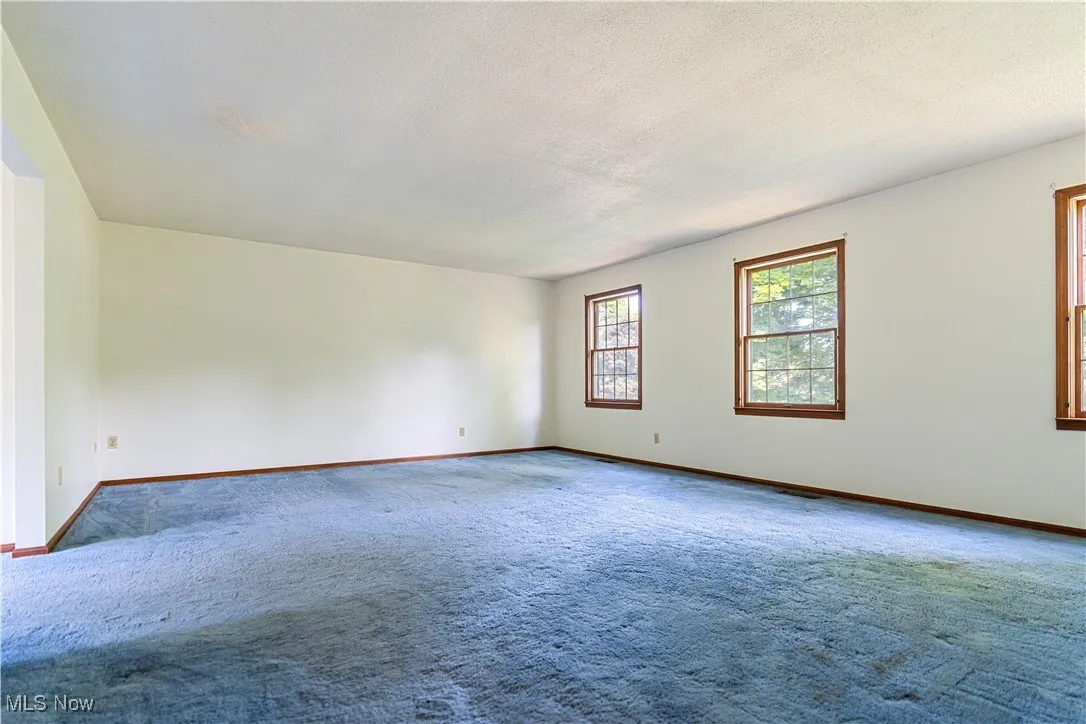 This is the primary suite.  This primary suite is large and can support all your furniture with ease.   Have a California King bed, no problem here.