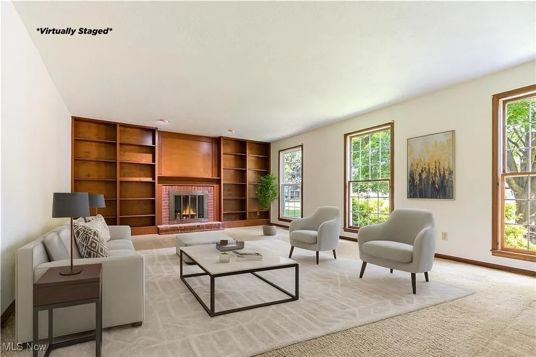 Virtually Staged - This will show you how much room is in this living room.   Lots of bright light.  A large sectional would fit perfect in this room also.