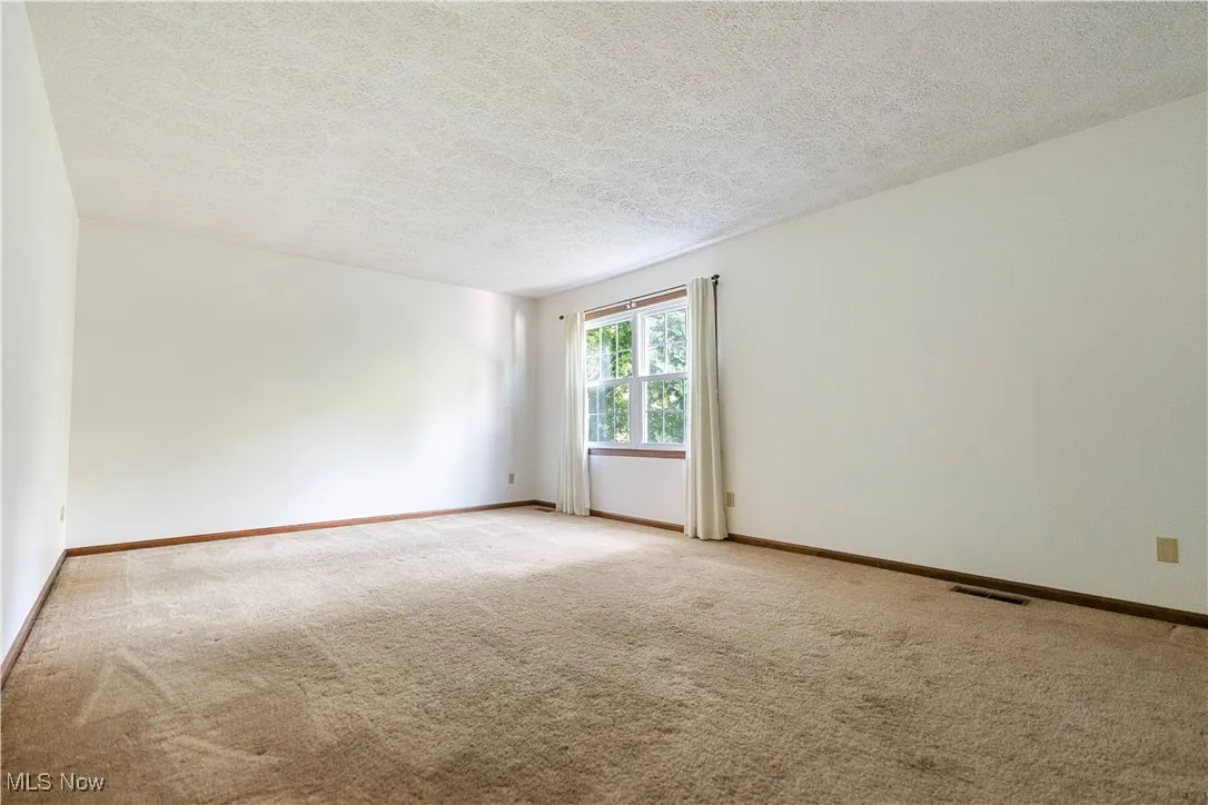 Wow this is a bedroom.  This could be another view of bedroom 4.  This room could be another primary suite, or just enjoy this large bedroom.