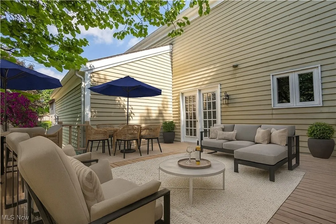 Virtually Staged - This is a view of what the deck could be.  It is a large deck and perfect for entertaining and lots of furniture space.