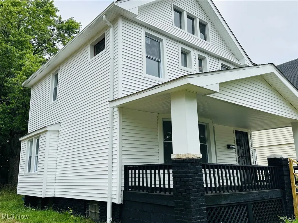 View of home's exterior featuring covered porch