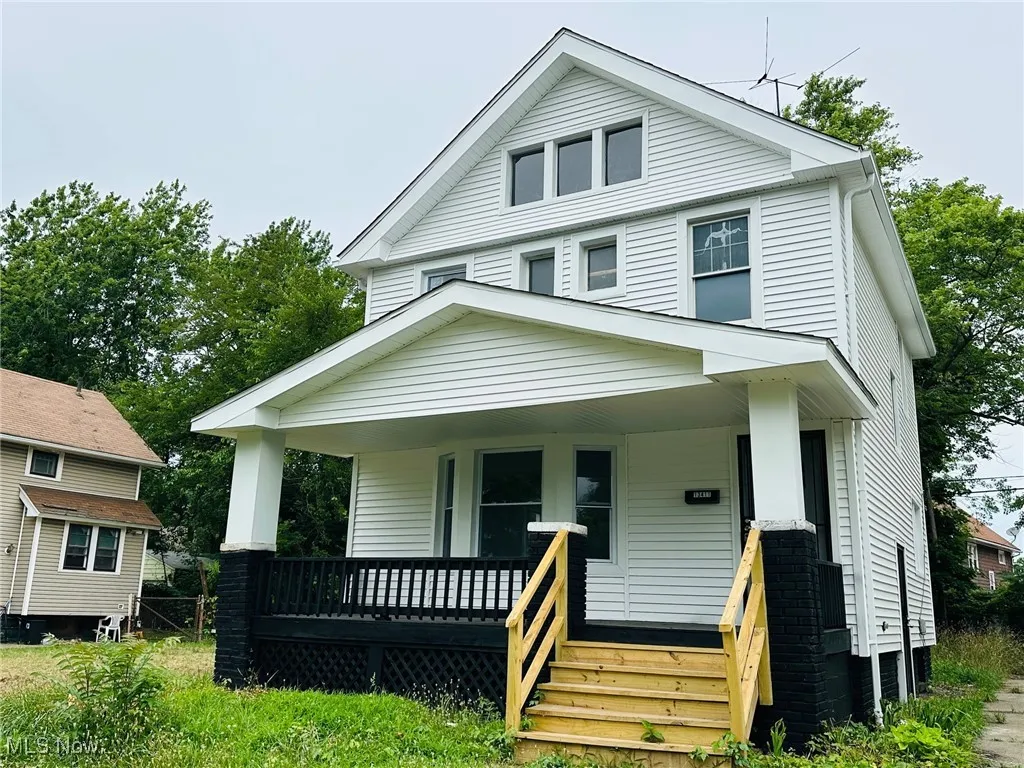 Traditional style home with a porch