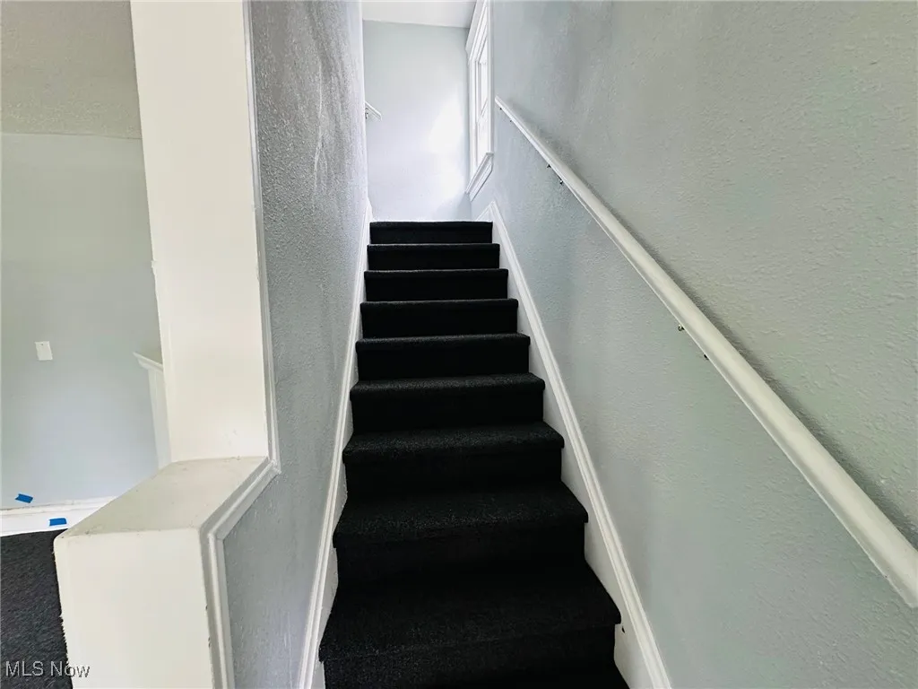 Stairway with a textured wall