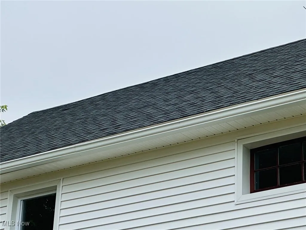 Exterior view of roof with shingles