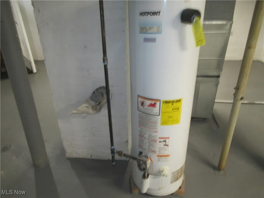 Utility room with gas water heater