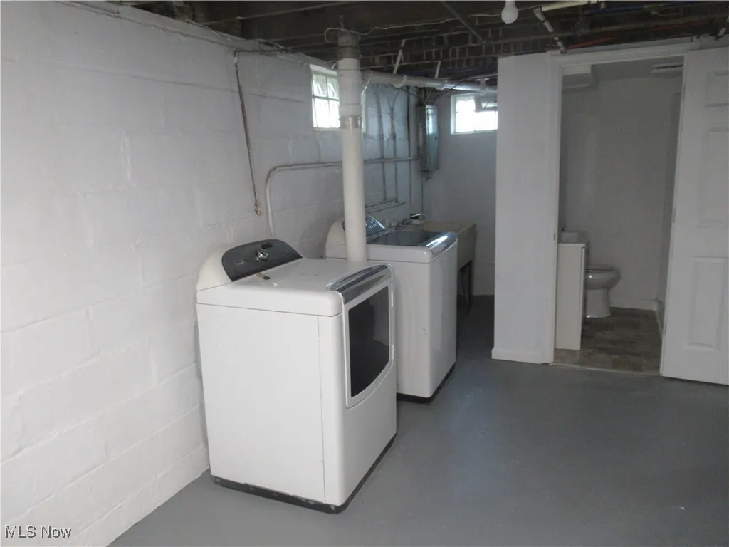 Washroom with separate washer and dryer