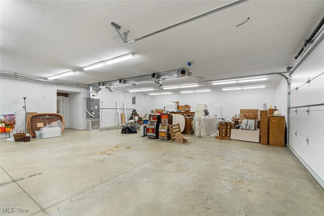 Garage featuring heating unit