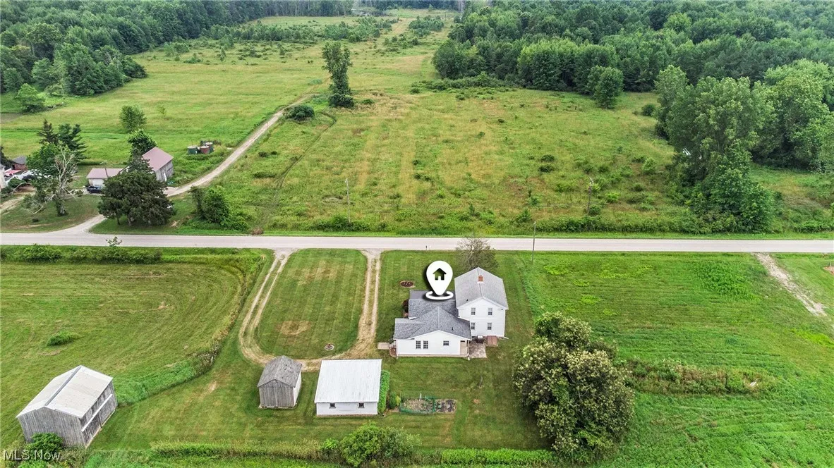 Aerial overview of property's location with rural landscape