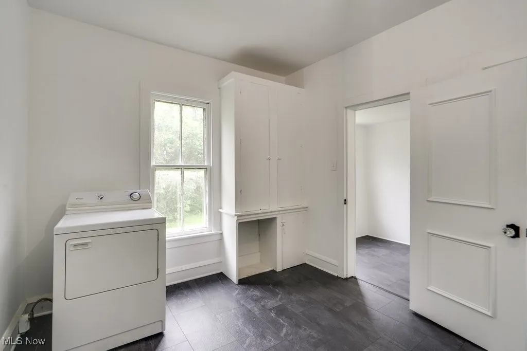 Laundry area featuring washer / dryer and plenty of natural light