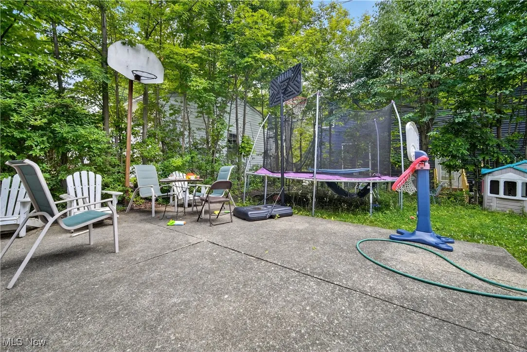 View of patio with a trampoline