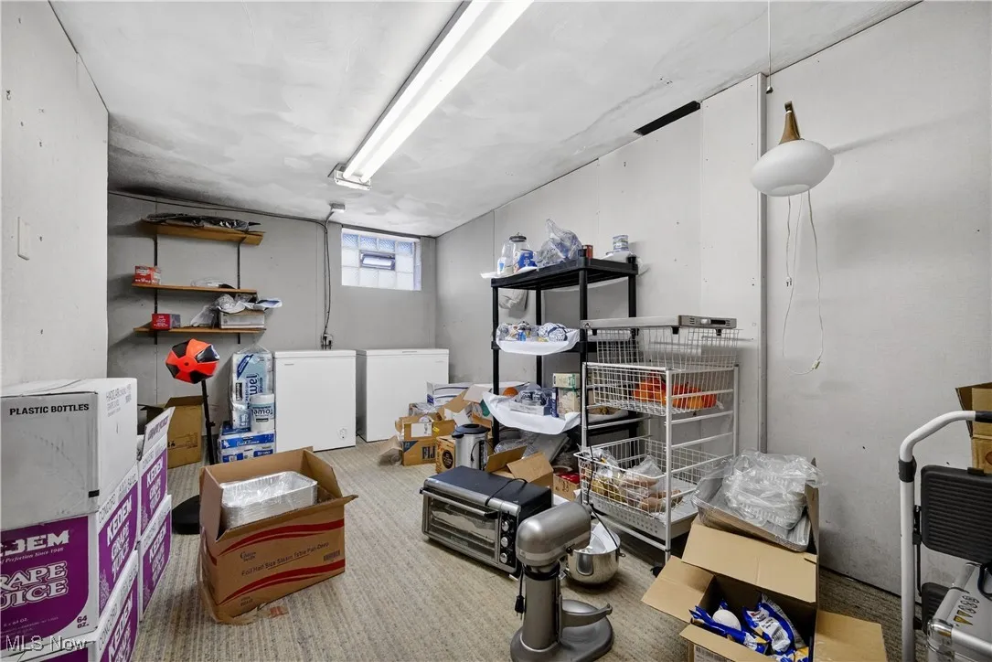 Basement with refrigerator