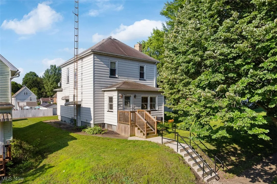 Front view of house featuring a deck