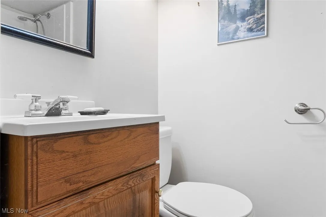Bathroom with toilet and vanity