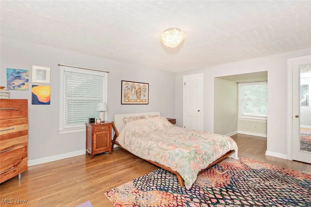 Bedroom with light wood-style flooring