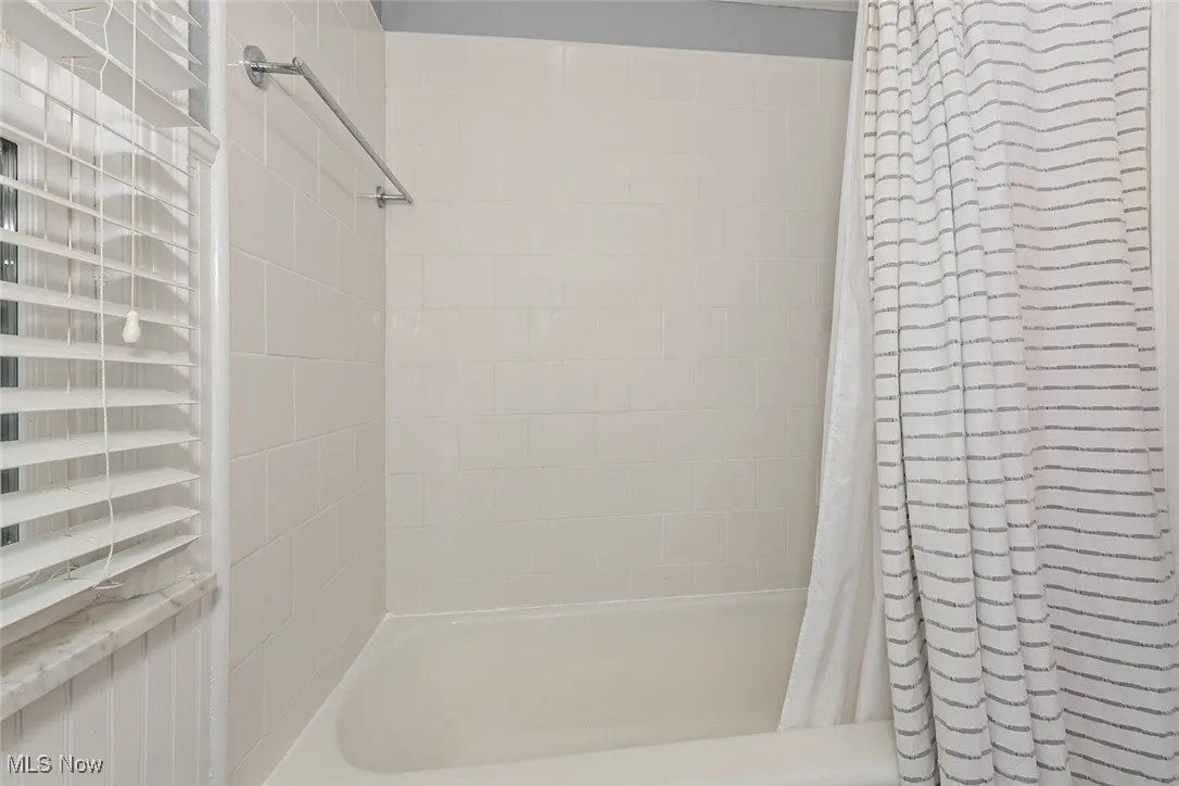 Bathroom with shower / tub combo