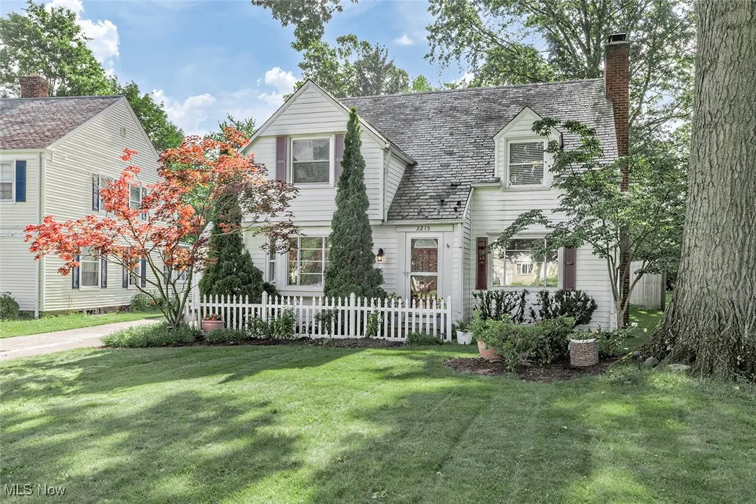 View of front of house with a chimney