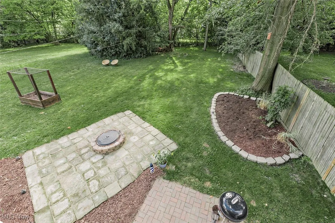 Fenced backyard featuring a patio area