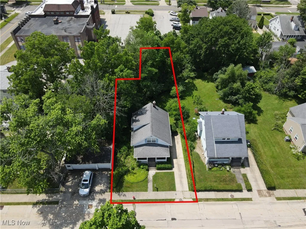 Aerial perspective of suburban area with property boundaries highlighted
