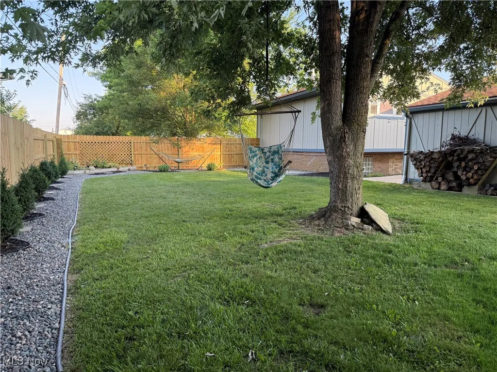 View of fenced backyard