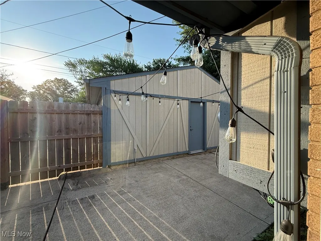 View of patio / terrace with a storage unit