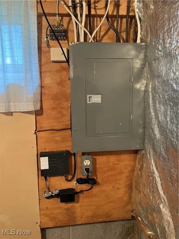 Utility room featuring electric panel