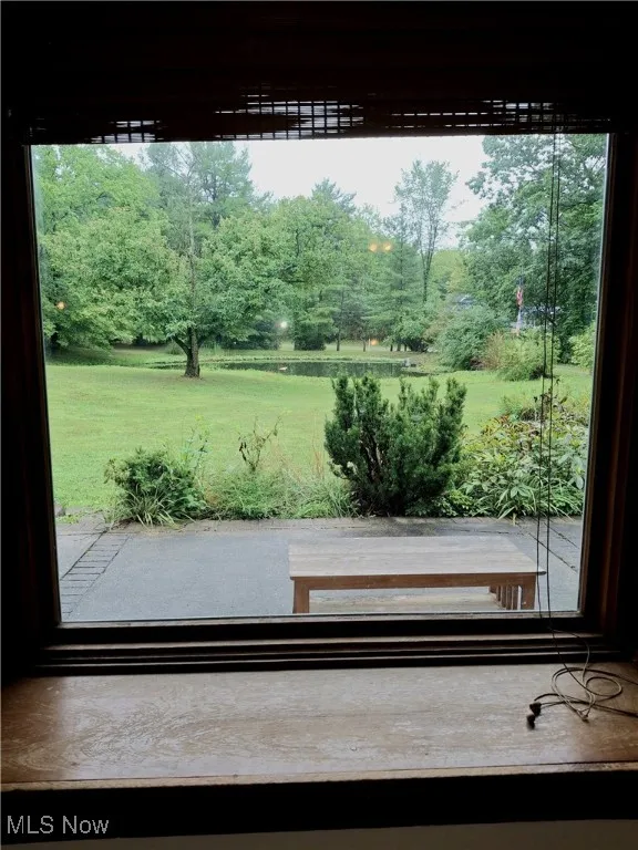 Entryway with view of scattered trees