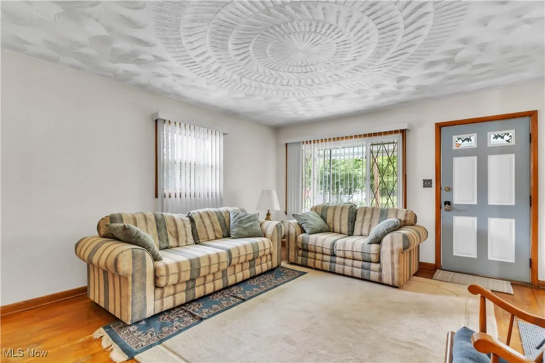 Living room featuring baseboards