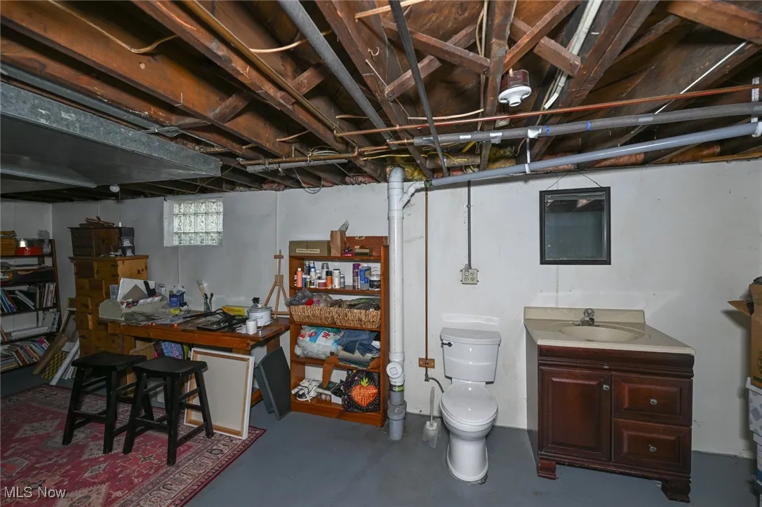 Below grade area with a sink