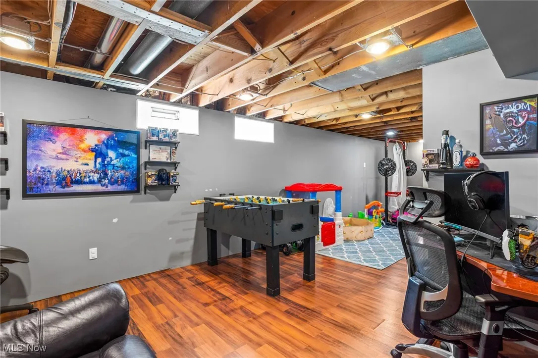 Game room featuring wood finished floors