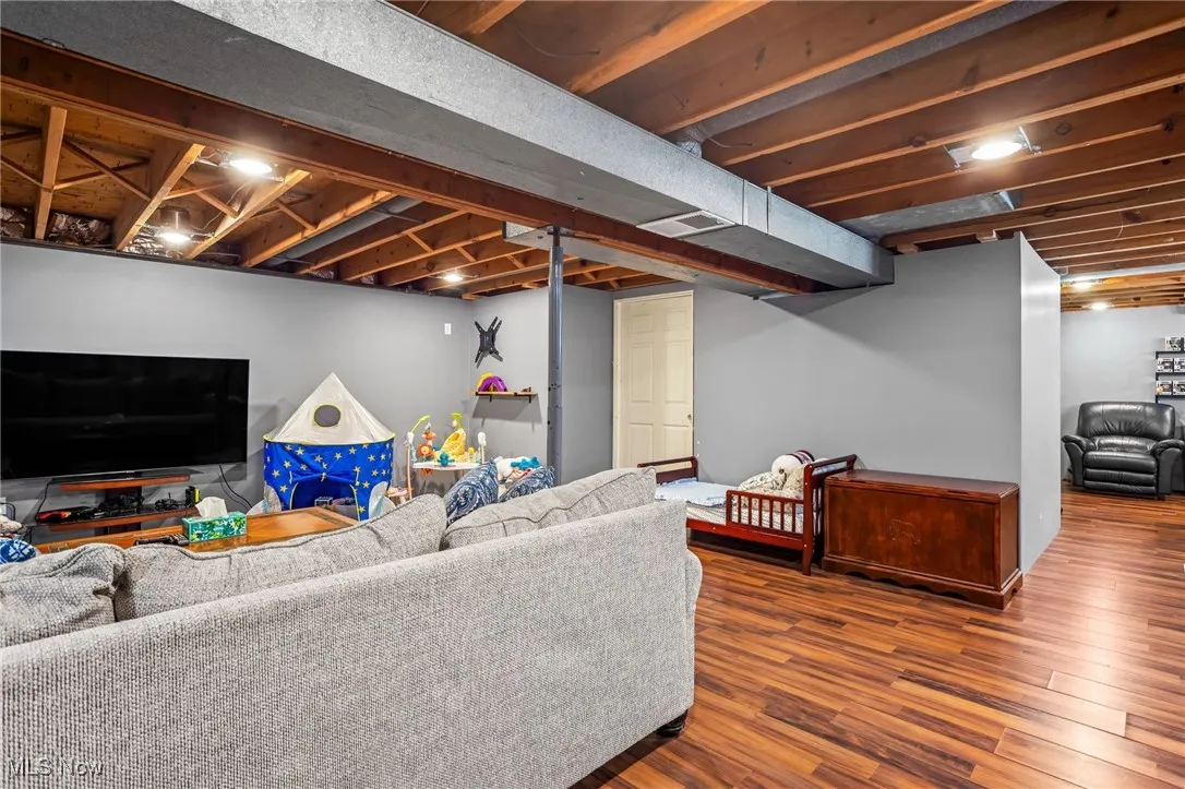 Living room featuring wood finished floors