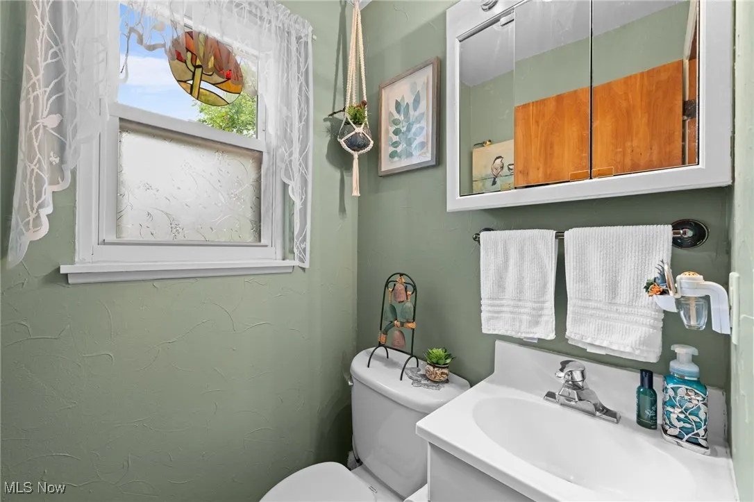 Bathroom with toilet and vanity