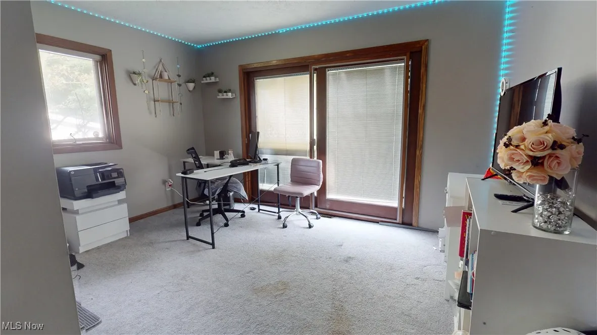 View of carpeted office/bedroom