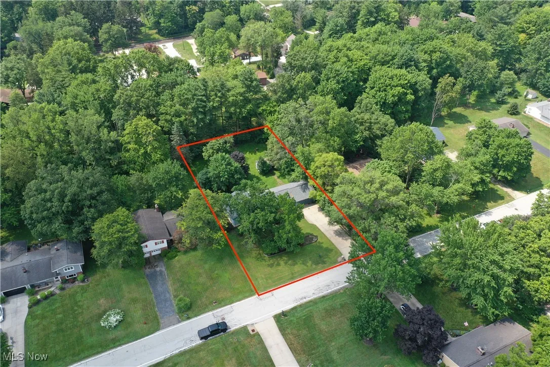 Aerial overview of property's location featuring property parcel outlined