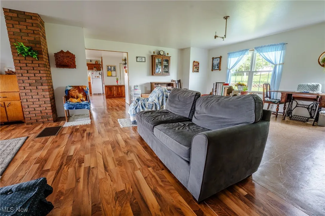 Living area with wood finished floors